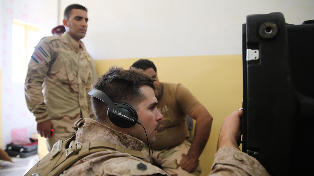 U.S. Marine Staff Sgt. Eric Alabiso, an information operations advisor with Task Force Al Asad, runs a diagnostic test on a Radio in a Box at Al Asad Air Base, Iraq, Sept. 28, 2015. The RIAB was provided by Iraq’s Ministry of Defense through the Iraq Train and Equip Fund. The fund was established by Combined Joint Task Force – Operation Inherent Resolve, a part of the multinational coalition force that helps improve the Iraqi military’s ability to fight against the Islamic State of Iraq and the Levant by providing training and advice to its soldiers and officers.  