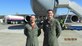 Capt. Julio Alvarez (left) and Lt. Col. James Quashnock stand in front of EMD-1, the 767-2C freighter that first flew to Boeing Field late last year, shortly after they were cleared to participate in flight testing. The Airmen, both experienced flight test pilots, will be responsible for military certification of Pegasus systems. (Courtesy photo)