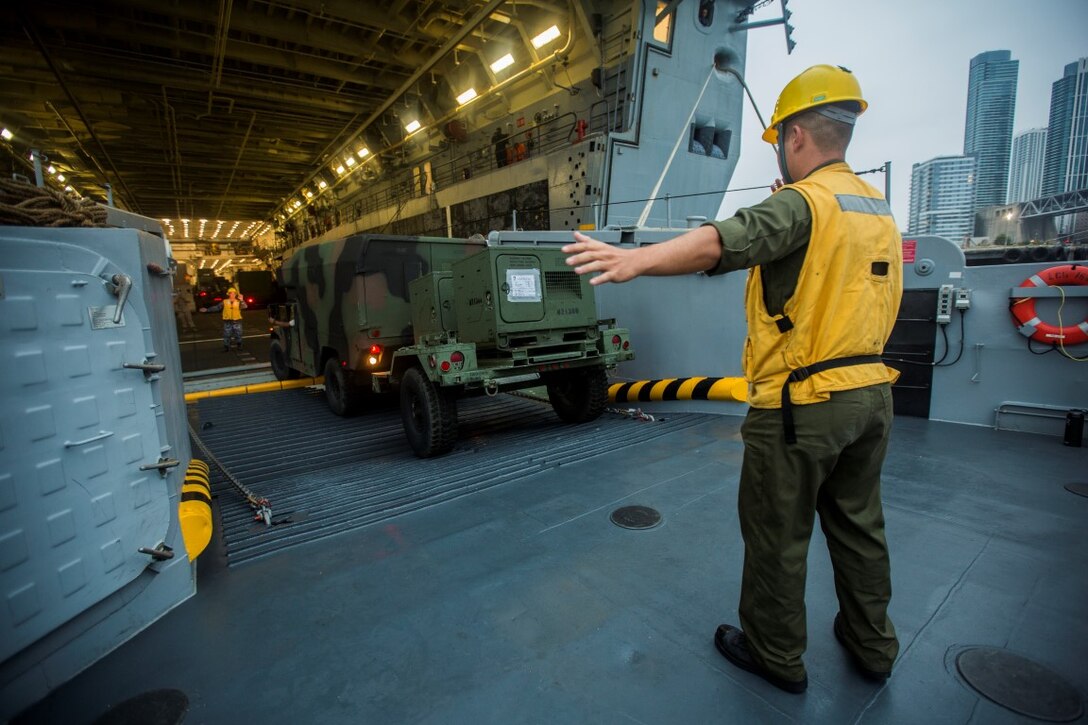 U.S. Navy Sailors with Landing Craft Unit 1629, Amphibious Craft Unit 1, move vehicles from ship to shore as part of San Francisco Fleet Week 2015, Oct. 7. SFFW 15’ is a week-long event that blends a unique training and education program, bringing together key civilian emergency responders and Naval crisis-response forces to exchange best practices focused on humanitarian assistance disaster relief with particular emphasis on defense support to civil authorities. (U.S. Marine Corps photo by Lance Cpl. Ryan Kierkegaard, 1st Marine Division Combat Camera/Released)