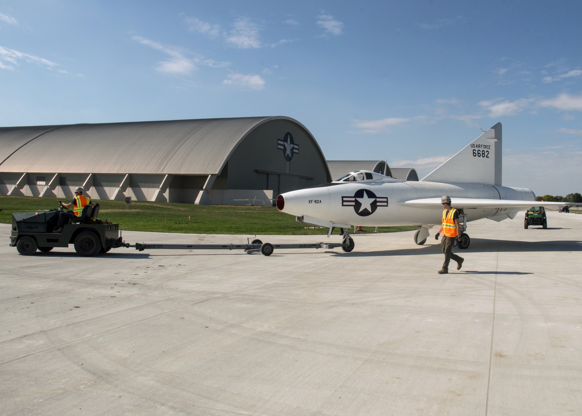 Restoration staff move the Convair XF-92A into the new fourth building at the National Museum of the U.S. Air Force on Oct. 7, 2015. (U.S. Air Force photo by Ken LaRock)