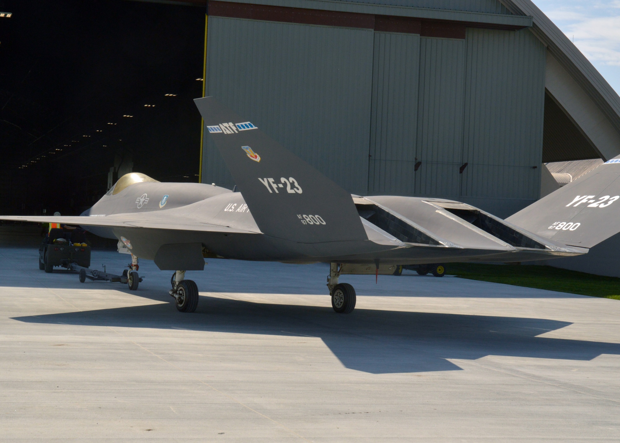 Restoration staff move the Northrop-McDonnell Douglas YF-23A into the new fourth building at the National Museum of the U.S. Air Force on Oct. 7, 2015. (U.S. Air Force photo by Ken LaRock)