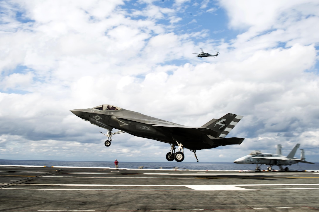 An F-35C Lightning II carrier-variant joint strike fighter prepares to make a landing aboard the aircraft carrier USS Dwight D. Eisenhower in the Atlantic Ocean, Oct. 4, 2015. U.S. Navy photo by Petty Officer 3rd Class Ryan U. Kledzik