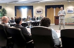 Defense Logistics Agency Director Air Force Lt. Gen. Andy Busch addresses customer support representatives and liaisons at the McNamara Headquarters Complex Sept. 1. Photo by Teodora Mocanu
