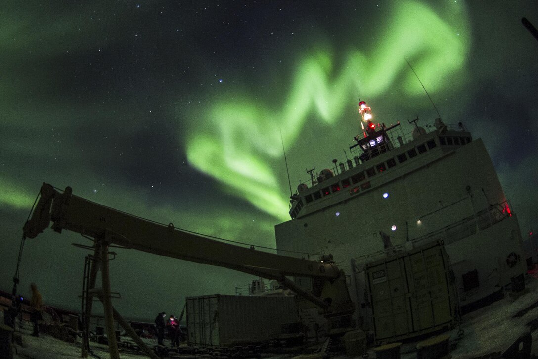 The aurora borealis are visible over the Coast Guard Cutter Healy in the Arctic Ocean, Oct. 4, 2015. The Healy is supporting the National Science Foundation-funded Arctic Geotraces project, part of an international effort to study the distribution of trace elements in the world's oceans. U.S. Coast Guard photo by Petty Officer 2nd Class Cory J. Mendenhall 