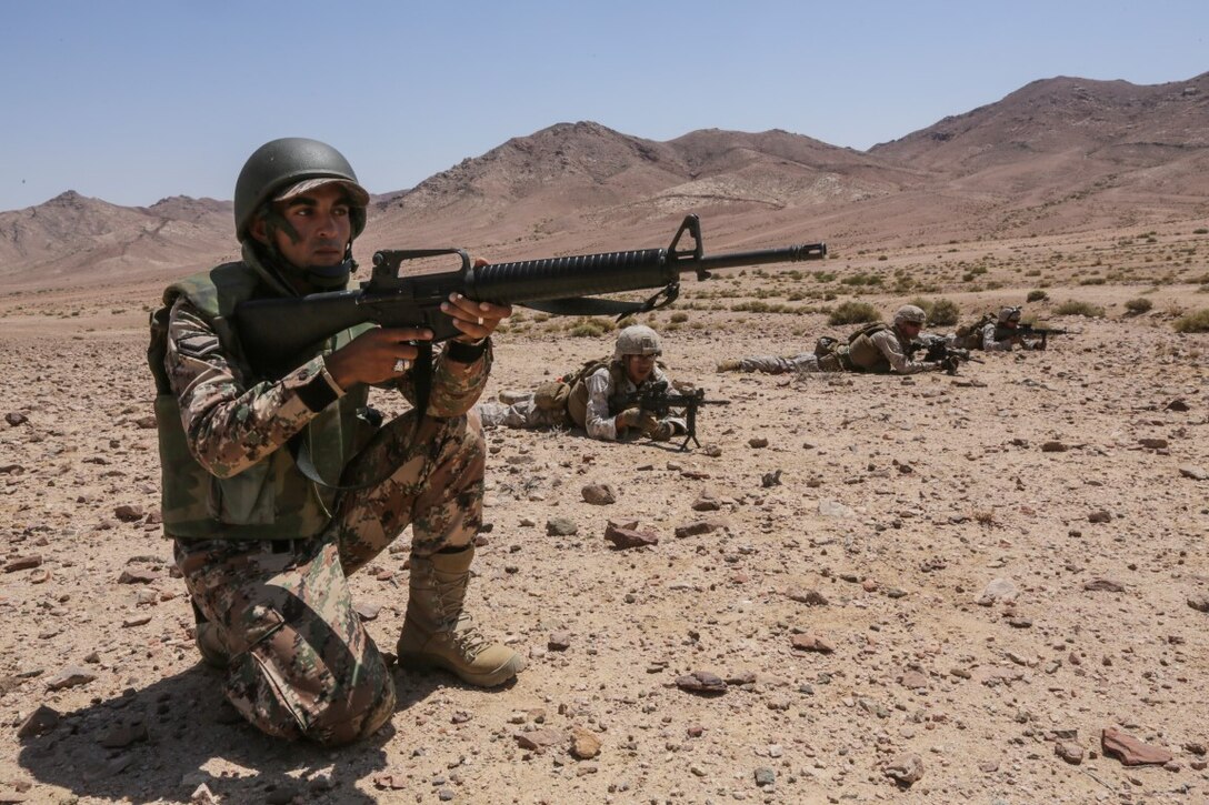 U.S. 5TH FLEET AREA OF RESPONSIBILITY (Aug. 25, 2015) Jordanian Soldiers and U.S. Marines with India Company, Battalion Landing Team 3rd Battalion, 1st Marine Regiment, 15th Marine Expeditionary Unit, provide security during a bilateral training exercise. The 15th MEU is deployed throughout the U.S. 5th Fleet area of responsibility to maintain regional security. (U.S. Marine Corps photo by Sgt. Jamean Berry/Released)