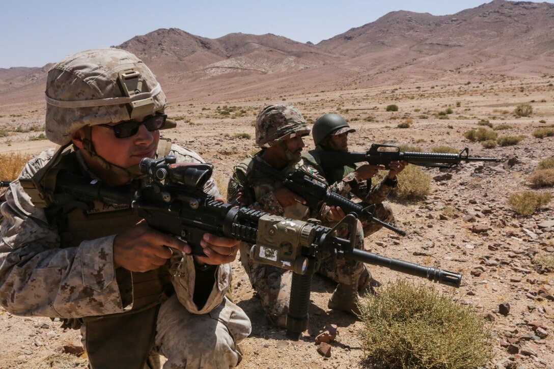 U.S. 5TH FLEET AREA OF RESPONSIBILITY (Aug. 25, 2015) U.S. Marine Lance Cpl. William Stedmen provides security alongside Jordanian Soldiers during a bilateral training exercise. Stedmen is an assaultman with India Company, Battalion Landing Team 3rd Battalion, 1st Marine Regiment, 15th Marine Expeditionary Unit. The 15th MEU is deployed throughout the U.S. 5th Fleet area of responsibility to maintain regional security. (U.S. Marine Corps photo by Sgt. Jamean Berry/Released)
