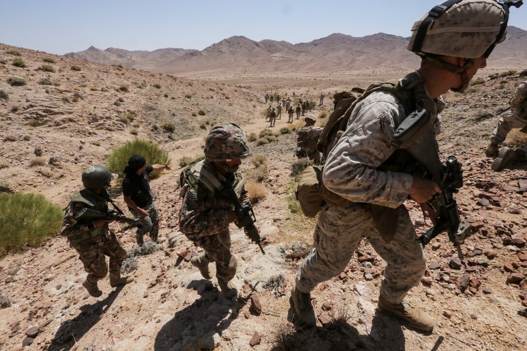 U.S. 5TH FLEET AREA OF RESPONSIBILITY (Aug. 25, 2015) U.S. Marines with India Company, Battalion Landing Team 3rd Battalion, 1st Marine Regiment, 15th Marine Expeditionary Unit, train with Jordanian Soldiers during a bi-lateral training evolution. The 15th MEU is deployed throughout the U.S. 5th Fleet area of responsibility to maintain regional security. (U.S. Marine Corps photo by Sgt. Jamean Berry/Released)