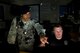 Senior Airman Colin Latham , 434th Security Forces Squadron fire team member,  and  Derek White, 434th Security Forces Squadron Department of the Air Force civilian police officer, monitor surveillance screens at Grissom Air Reserve Base, Ind., Sept. 29, 2015. Grissom is one of only five Air Reserve Command bases in the nation, and the 434th SFS staff work around-the-clock to ensure the mission continues by providing base security and police services. (U.S. Air Force Photo/Tech. Sgt. Benjamin Mota)