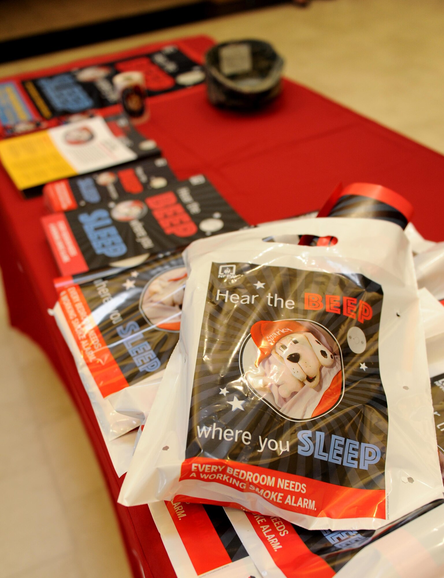 Fire safety literature hand-outs sit on display at the Base Exchange during Fire Prevention Week, Oct. 5, 2015, Keesler Air Force Base, Miss. The week-long event includes fire drills and stove fire demonstrations around the base and concludes with an open house at the fire department Oct. 10. (U.S. Air Force photo by Kemberly Groue)