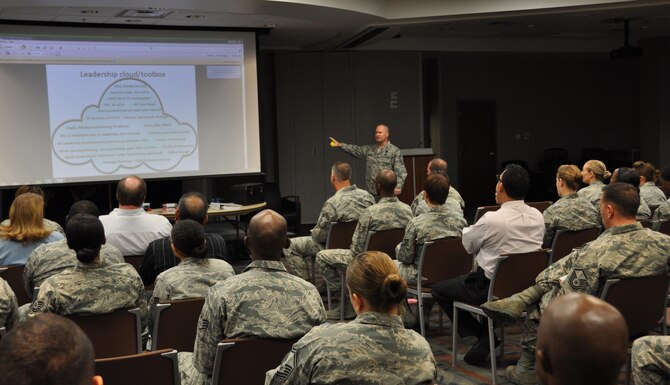 Chief Master Sgt. J. Seth Perron, Headquarters Individual Reservist Readiness and Integration Organization command chief, addresses the audience at the Air Reserve Personnel Center during ARPC’s October Leadership Seminar Oct. 8, 2015, on Buckley Air Force Base, Colo. (U.S. Air Force photo/Tech. Sgt. Rob Hazelett)