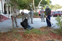 Air Force Recruiting Service personnel rake leaves at the AFRS headquarters building during Joint Base San Antonio’s Proud Week Oct. 8, 2015 at JBSA-Randolph. Proud Week gives JBSA members an opportunity to pause from daily operations and focus on maintaining a high beautification standard throughout JBSA. (U.S. Air Force photo by Joel Martinez/Released) 