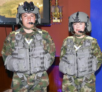 Colombian soldiers pose in aviator gear during the opening ceremonies of the International Aviation Conference of the Armies 2015, held in Bogota, Colombia, Sept. 22-24.

