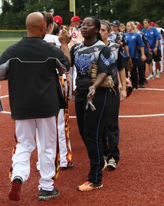 Members of the U.S. Air Force women’s softball team congratulate members of the U.S. Marine Corps women’s softball team during the 2015 Armed Forces Softball Championship at the intramural softball field on Camp Lejeune, N.C., Sept. 24, 2015. 160 athletes representing the U.S. Army, Marine Corps, Navy, and Air Force competed during a weeklong softball tournament hosted by Marine Corps Community Services. (U.S. Marine Corps photo by Cpl. Caleb McDonald, MCIEAST-MCB CAMLEJ Combat Camera/Released)