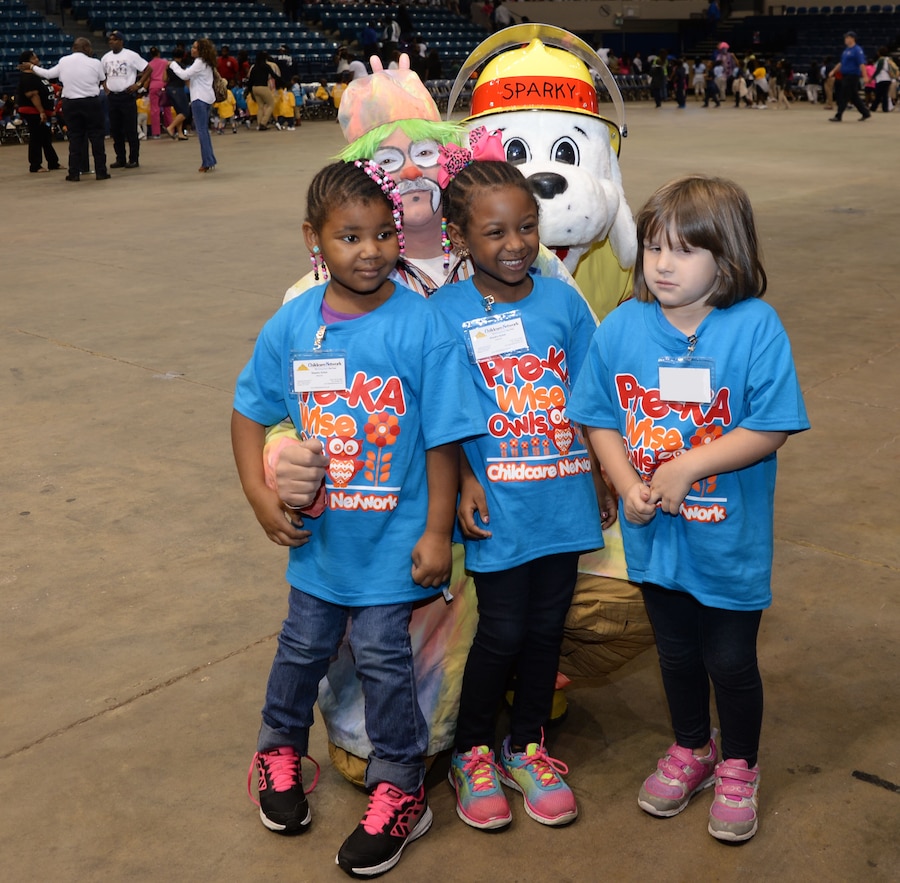 William A. Thomas, firefighter/emergency medical technician and Sparky the Fire Dog, both from Marine Corps Logistics Base Albany, are two of several first responders and volunteers entertaining hundreds of children attending the Fire Safety Show at Albany’s James H. Gray Civic Center, Oct. 7. The city’s 21st annual event was held as part of activities scheduled to commemorate “The Great Chicago Fire” and Fire Prevention Week.
