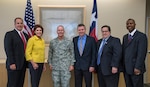 Mr. John Busarello, Director of Business Rental Sales Enterprise Rent a Car, Ms. Diane Rath, Executive Director Alamo Area Council of Governments, Brig. Gen. Bob LaBrutta, 502nd Air Base Wing and Joint Base San Antonio commander, Mr. James Kessler, Chief Operating Officer vRide, Mr. Kieth Hom, Deputy CEO VIA Metropolitan, and Mr. James Williams, Deputy Director 502nd Logistics Readiness Squadron, meet Oct. 6 at Port San Antonio to establish the JBSA Virtual Commuter Center and its new RideShare program. 