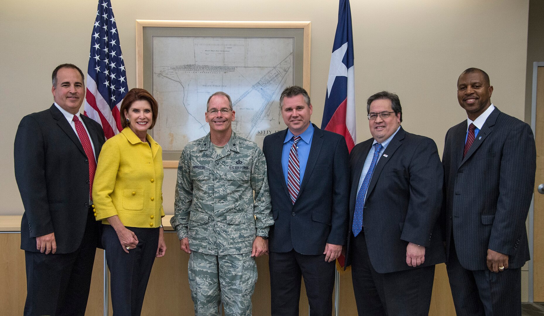 Mr. John Busarello, Director of Business Rental Sales Enterprise Rent a Car, Ms. Diane Rath, Executive Director Alamo Area Council of Governments, Brig. Gen. Bob LaBrutta, 502nd Air Base Wing and Joint Base San Antonio commander, Mr. James Kessler, Chief Operating Officer vRide, Mr. Kieth Hom, Deputy CEO VIA Metropolitan, and Mr. James Williams, Deputy Director 502nd Logistics Readiness Squadron, meet Oct. 6 at Port San Antonio to establish the JBSA Virtual Commuter Center and its new RideShare program. 