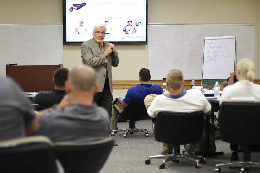 Larry Maxwell, a U.S. Army Military Police School instructor based at Fort Lenard Wood, Mo., teaches Domestic Violence Intervention Training at the Federal Law Enforcement Training Center in Charleston, South Carolina during Guardian Shield 2015. Guardian Shield is an annual training event for Army Reserve CID agents.