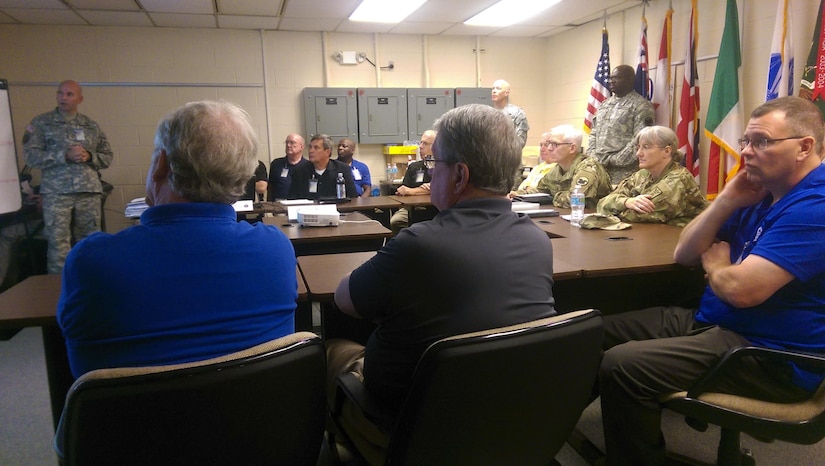 Maj. Mark Radicchi of the 733rd Military Police Battalion (CID) briefs Maj. Gen. Peter S. Lennon, the Deputy Commanding General (Support) of U.S. Army Reserve Command; Brig. Gen. Kelly Wakefield, Deputy Commanding General, 200th Military Police Command; and Army Reserve Ambassadors from across the country on Guardian Shield 2015 at the Federal Law Enforcement Training Center in Charleston, S.C. Guardian Shield is an annual training event for Army Reserve CID agents.