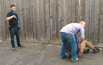 Army Reserve Soldiers apprehend a drug dealer during a mock drug bust as part of Drug Surveillance Training at Guardian Shield 2015. Guardian Shield is an annual training event for Army Reserve law enforcement professionals. The Federal Law Enforcement Training Center in Charleston, S.C., is this site of this year’s event.