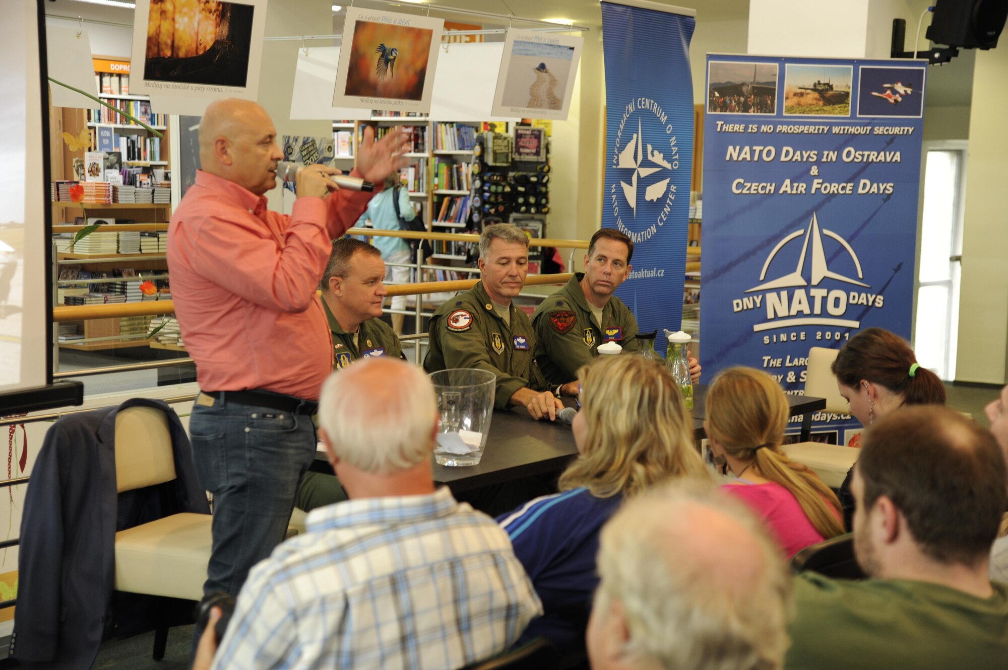 U.S. Air Force Airmen of the 307th Bomb Wing prepare to answer questions at the Librex bookstore in Ostrava, Czech Republic on Sep. 18, 2015. They spoke about their aircraft and military experience in a public forum while in Ostrava for NATO Days 2015. (Photo courtesy of U.S. Air Force Capt. Kerry Baker/Released)