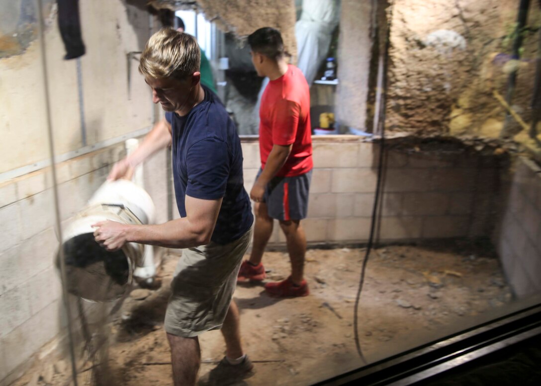 U.S. Marines with 1st Battalion, 4th Marine Regiment, Marine Rotational Force – Darwin pour dirt in a display while refurbishing and repairing animal habitat displays at the Territory Wildlife Park, Northern Territory, Australia Sept. 29. The Marines have been volunteering at this site since the beginning of their six-month rotation in Darwin, Australia as a part of engagement with the local community. Beyond purely military training, Marines’ involvement in community engagements in the Northern Territory shows their appreciation for Australia’s hospitality.