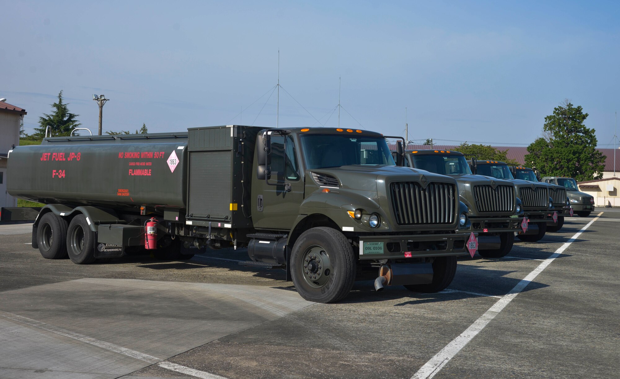Fuel trucks sit parked in the 374th Logistics Readiness Squadron fuels management flight parking lot at Yokota Air Base, Japan, Oct. 1, 2015. The mission of the fuels management flight is to provide clean and dry aviation fuel to transient and home station aircraft in a safe and timely manner. (U.S. Air Force photo by Senior Airman David Owsianka/Released)