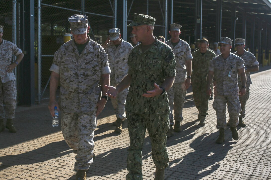 U.S. Navy Adm. Scott H. Swift, U.S. Marine Corps Lt. Gen. John A. Toolan and distinguished guests inspect the Marine Rotational Force – Darwin facilities Oct. 4 at Robertson Barracks, Palmerston, Australia. The Marines and sailors spoke of new changes coming to the next rotation of Marines in Australia, their capabilities as a Marine Air-Ground Task Force and the overall mission of MRF-D. This deployment demonstrates how the MAGTF is equipped and organized to carry out national objectives in cooperation with our international partners. Swift is the current commander of U.S. Pacific Fleet and Toolan is the commanding general of U.S. Marine Corps Forces, Pacific. 