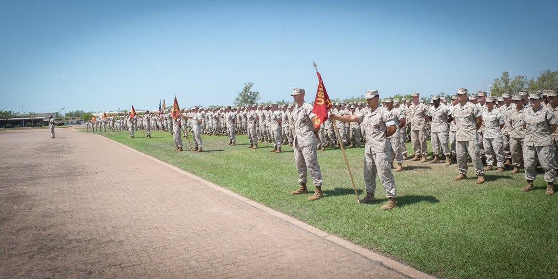 U.S. Marines with 1st Battalion, 4th Marine Regiment, Marine Rotational Force - Darwin stand in formation Oct. 5 during a farewell ceremony hosted by 1st Brigade, Australian Army, at Robertson Barracks, Northern Territory, Australia. U.S. Marine Corps Maj. Gen. Richard Simcock and Australian Brig. Mick Ryan congratulated the Marines on their hard work and the amount of effort they’ve shown throughout their time participating in training exercises, performing community services and immersing in Australian culture. The rotational deployment of U.S. Marines in Australia affords an unprecedented combined training opportunity with our allies and improves interoperability between our forces. Simcock is the commanding general of 3rd Marine Division, III Marine Expeditionary Force and Ryan is the commander of 1 BDE. 