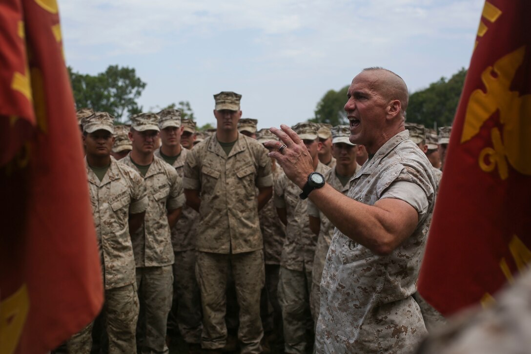 U.S. Marine Corps Maj. Gen. Richard Simcock addresses 1st Battalion, 4th Marine Regiment, Marine Rotational Force – Darwin, Oct. 6 at Robertson Barracks, Palmerston, Australia. Simcock and Sgt. Maj. Vincent Santiago congratulated the Marines on their hard work and the amount of effort they’ve shown throughout their time with 1st Brigade, Australian Army while participating in training exercises, performing community services and immersing in Australian culture. The rotational deployment of U.S. Marines in Australia affords an unprecedented combined training opportunity with our allies and improves interoperability between our forces. Simcock and Santiago are the commanding general and sergeant major of 3rd Marine Division, III Marine Expeditionary Force.