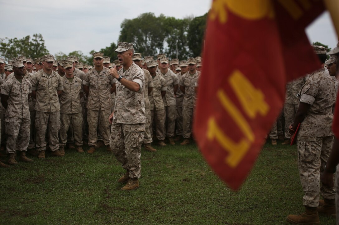 U.S. Marine Corps Col. David Odom and Sgt. Maj. Mario Fields address Marines with 1st Battalion, 4th Marine Regiment, Marine Rotational Force – Darwin, after an awards ceremony Oct. 6 at Robertson Barracks, Palmerston, Australia. Odom and Fields congratulated the Marines on their hard work and the amount of effort they’ve shown throughout their time working with 1st Brigade, Royal Australian Army during training exercises, performing community services or immersing in Australian culture. The rotational deployment of U.S. Marines in Australia affords an unprecedented combined training opportunity with our allies and improves interoperability between our forces. Odom and Fields are the commanding officer and sergeant major of 4th Marine Regiment, 3rd Marine Division, respectively. 