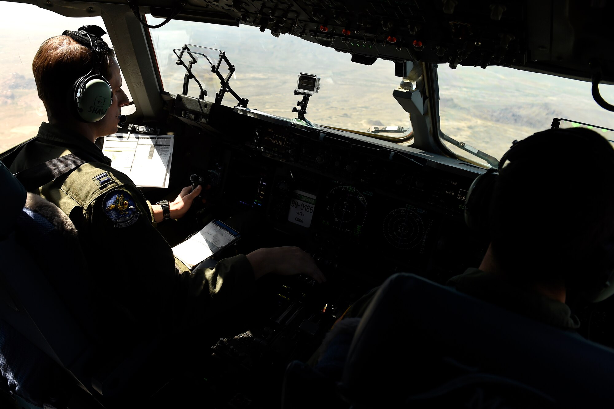 Capt. Capt. J.D. Shaw, 8th Airlift Squadron C-17 pilot, approaches White Sands, N.M., Sept. 27, 2015 during an Emergency Deployment Readiness Exercise. Shaw flew one of three C-17s from the 62nd Airlift Wing that delivered cargo and soldiers from the 82nd Airborne Division at Pope Army Airfield, N.C. (U.S. Air Force photo/Staff Sgt. Tim Chacon)