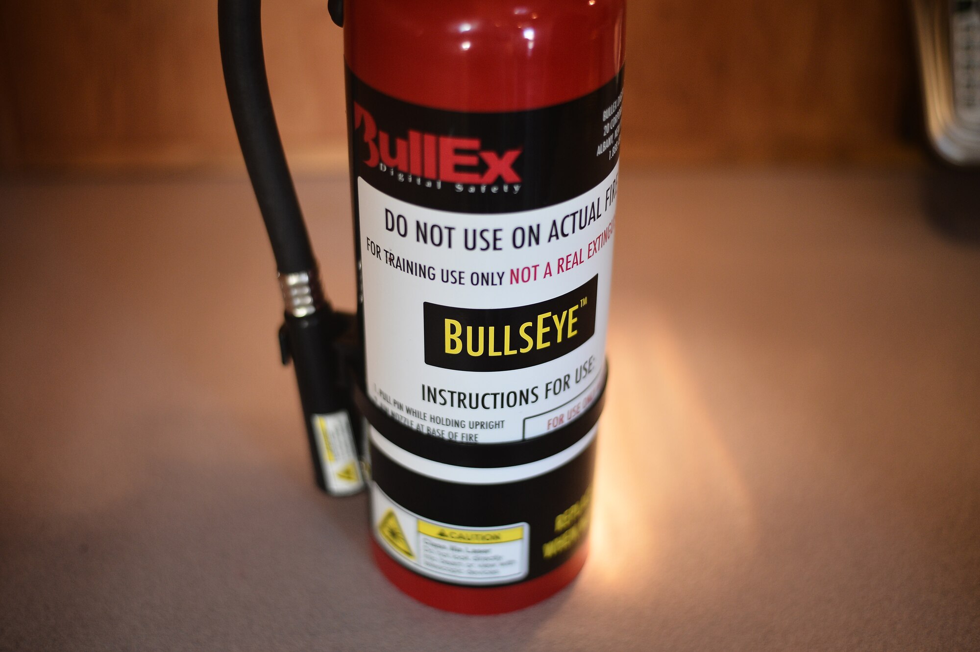 The Buckley Fire Department offered fire extinguisher training Oct. 8, 2015, on Buckley Air Force Base, Colo. The training, which involved pointing a fake fire extinguisher at simulated house fires, was just one of many events during Fire Prevention Week. (U.S. Air Force photo by Staff Sgt. Darren Scott/Released)
