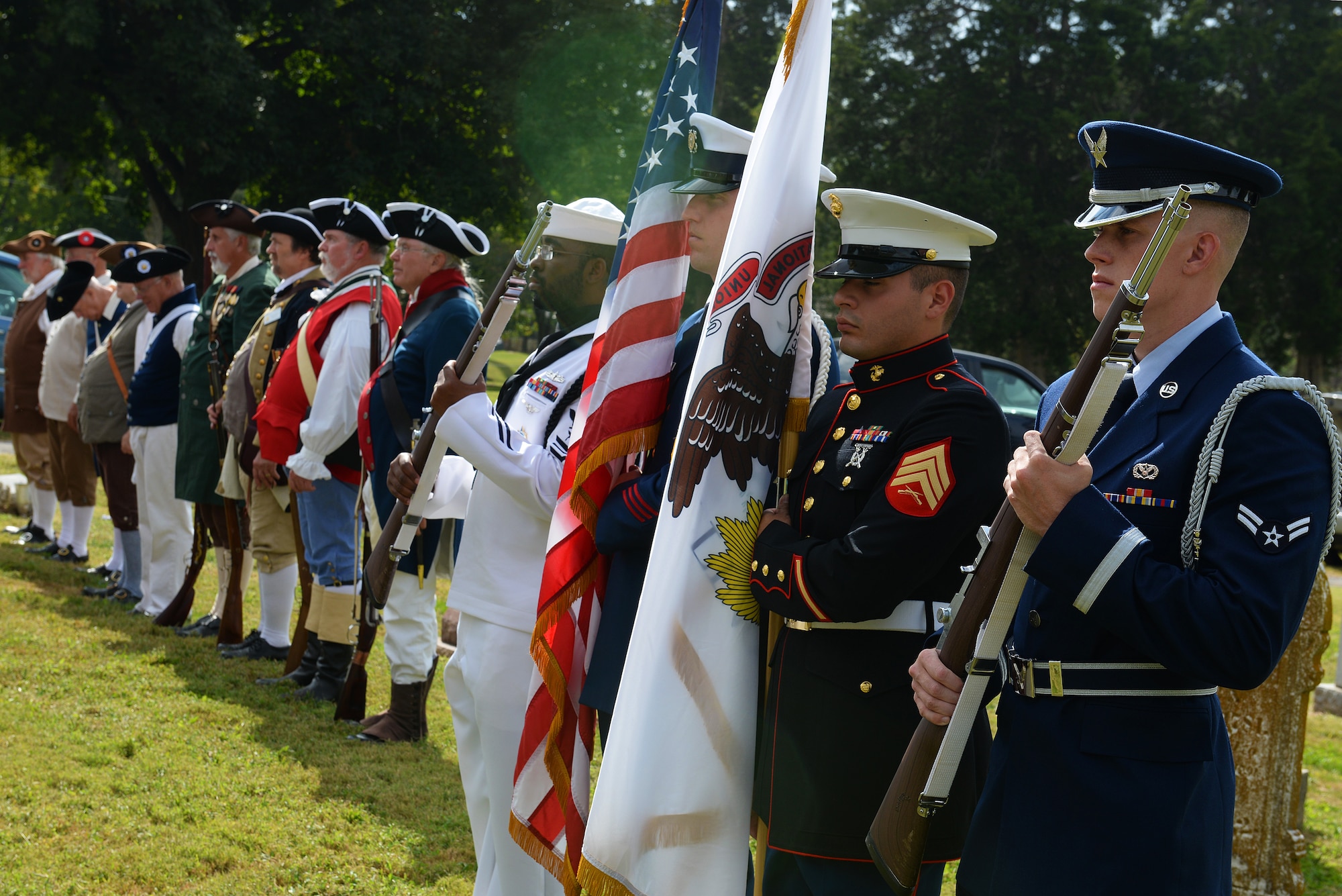 The Scott Air Force Base, Illinois Color Guard performs with the Sons of the American Revolution Color Guards during a dedication of a cenotaph to Capt. Joseph Ogle at the Shiloh Valley Cemetery, Shiloh, Illinois, Sept. 27, 2015. Ogle was an Illinois territory pioneer and Revolutionary War patriot who settled in St. Clair County after the War and founded the First Methodist Church in Shiloh when Illinois was a territory. (U.S. Air Force photo by Airman 1st Class Erica Holbert-Siebert)
