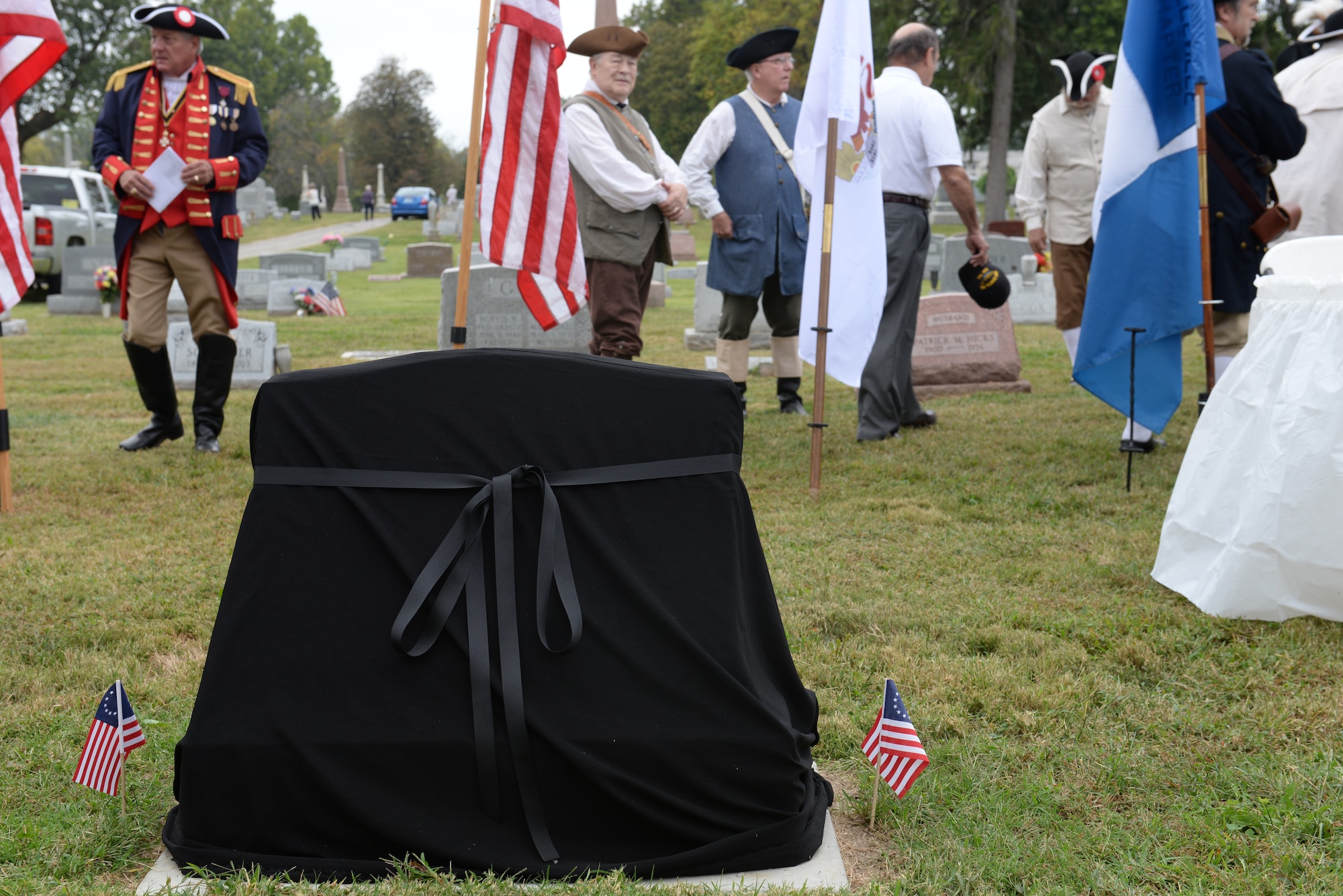 Capt. Joseph Ogle’s cenotaph prior to unveiling at a dedication ceremony at the Shiloh Valley Cemetery, Shiloh, Illinois, Sept. 27, 2015. Ogle was an Illinois territory pioneer and Revolutionary War patriot whose efforts included defending Fort Henry, in what is now Wheeling, West Virginia. (U.S. Air Force photo by Airman 1st Class Erica Holbert-Siebert) 