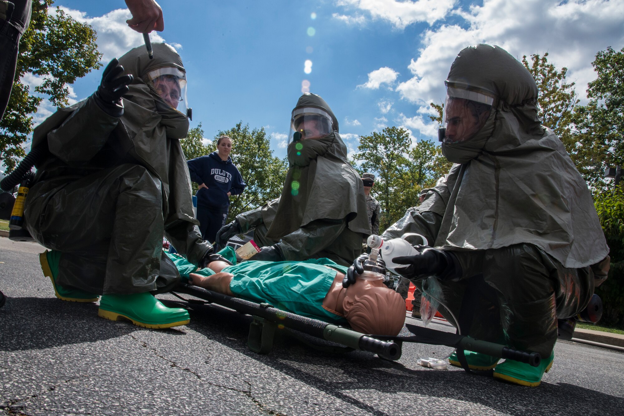 Medical Group members participate in a quarterly decontamination training, at the Scott Air Force Base Medical Clinic, October 1, 2015. The training consisted of setting up a decon tent to be able to take care of a patient as fast, safe, and thoroughly as possible. (U.S. Air Force photo by Airman Gwendalyn Smith)