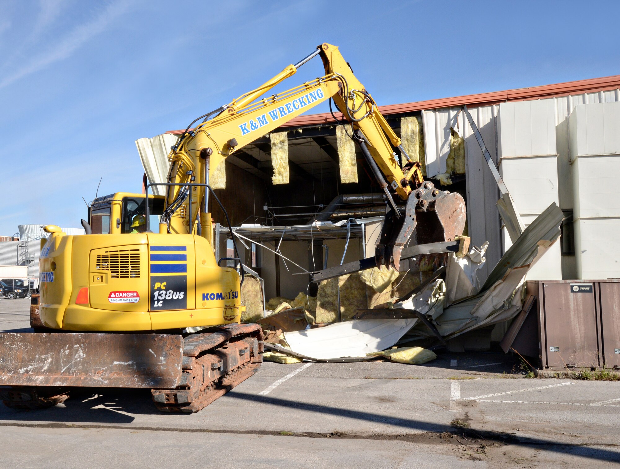 Bldg. 3333 is coming down. After approximately 15 years, demolition on the temporary building has begun and is expected to take about a month. A new OG&E electrical substation will be built soon after to replace the old substation which recently failed. Additional parking spaces will replace the site of the old substation. (Air Force photo by Kelly White/Released) 