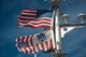 The U.S. and U.S. Coast guard flags fly over a U.S. Coast Guard response boat during a search and rescue training mission, Sept. 24, 2015, off the coast of North Carolina. Sailors from Coast Guard Station Hobucken, North Carolina, teamed with Airmen from Seymour Johnson AFB, North Carolina to conduct an exercise and their survival and rescue skills to the test. (U.S. Air Force photo/Airman Shawna L. Keyes)