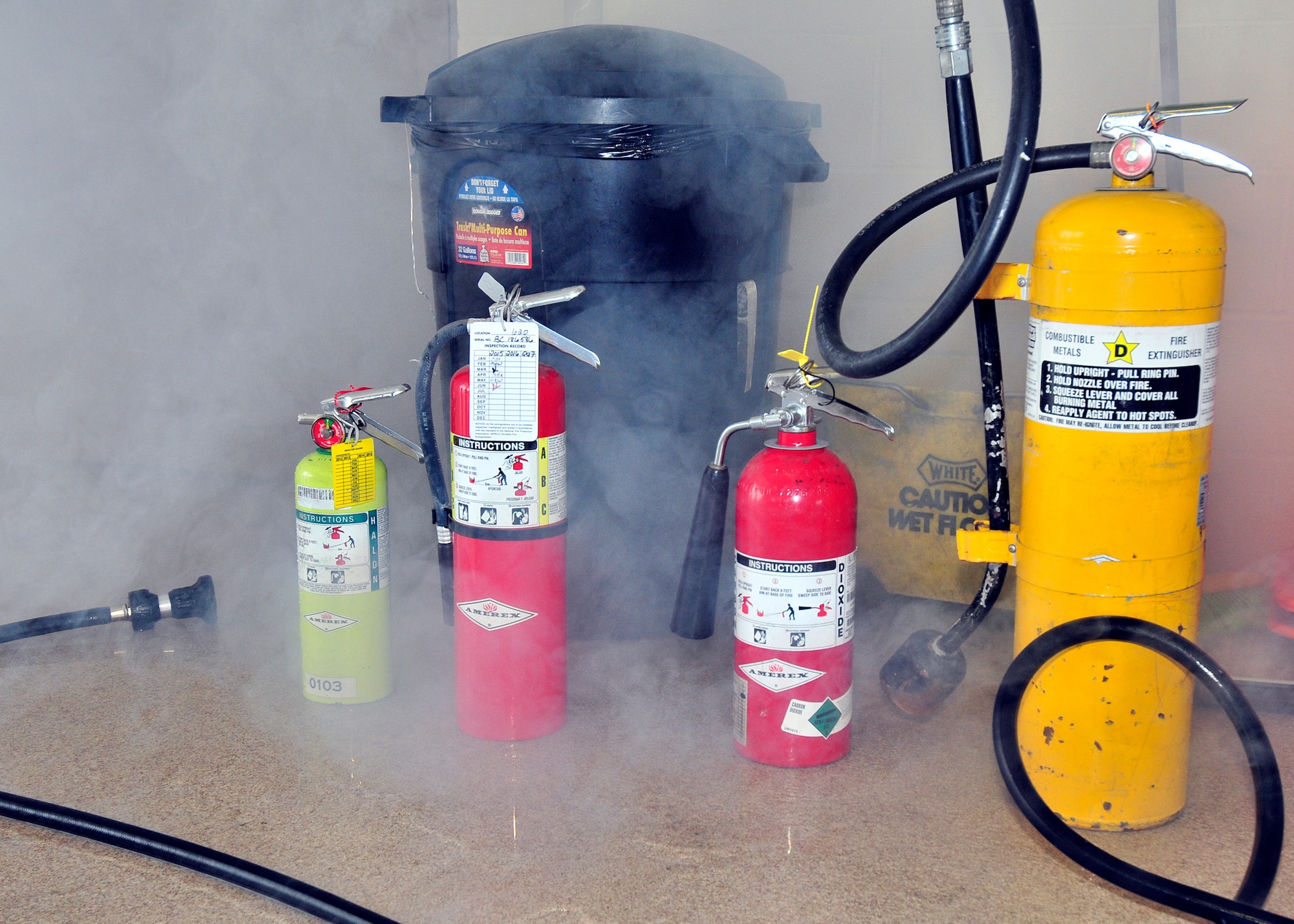 Senior Airman Irvin Buck, Heavy Machinery Operator, 914th CES practices putting out a simulated fire on the new Attack Digital Fire Training System at the Niagara Falls Air Reserve Station, New York on October 7, 2015. National Fire Prevention Week runs this year from October 4 – 10. (U. S. Air Force photo by Peter Borys)