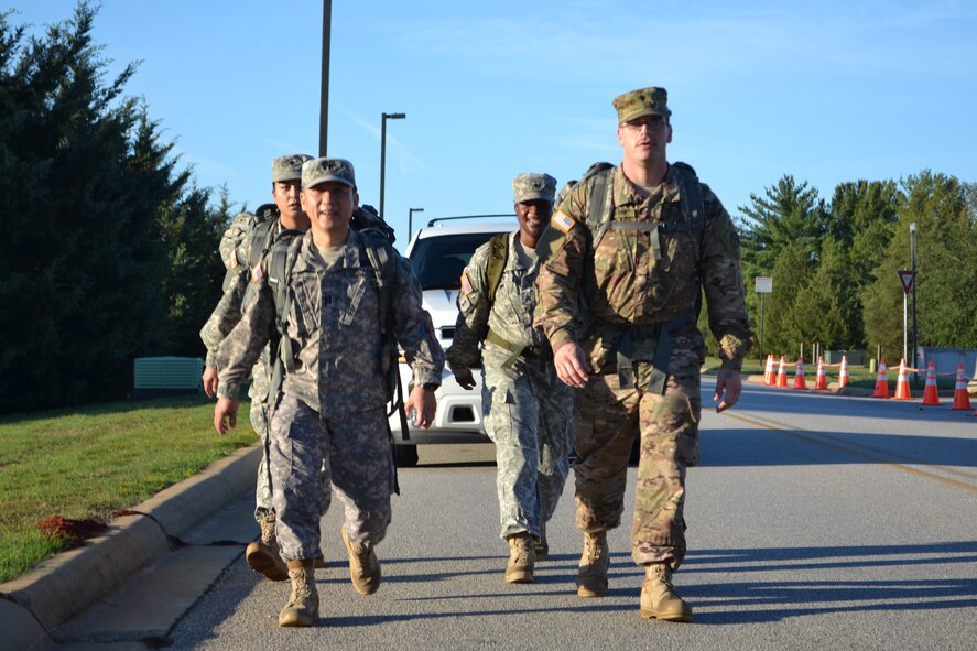 United States Army Central Soldiers Capt. (CH) Taylor Kim, Specialists Porter and Pielago and Sgt. Ford participated in the USARCENT Prayer Ruck March today on Shaw Air Force Base. The march was an eight-mile trek, which they did while carrying 30-lb. ruck sacks. The event is designed to promote a supportive environment for spiritual fitness, to build morale, and foster unit cohesion. The group prayed for all leaders, Soldiers, Airmen, family members and civilians in USARCENT during the event. (U.S. Army photo by Master Sgt. Gary L. Qualls, Jr., USARCENT Public Affairs.)