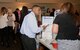 Local employers discuss potential career opportunities with members of Team Seymour at a job fair, Oct. 6, 2015, at Seymour Johnson Air Force Base, North Carolina. Pamphlets and other informative items were at each booth for those who attended the job fair. (U.S. Air Force photo/Airman 1st Class Ashley Williamson) 