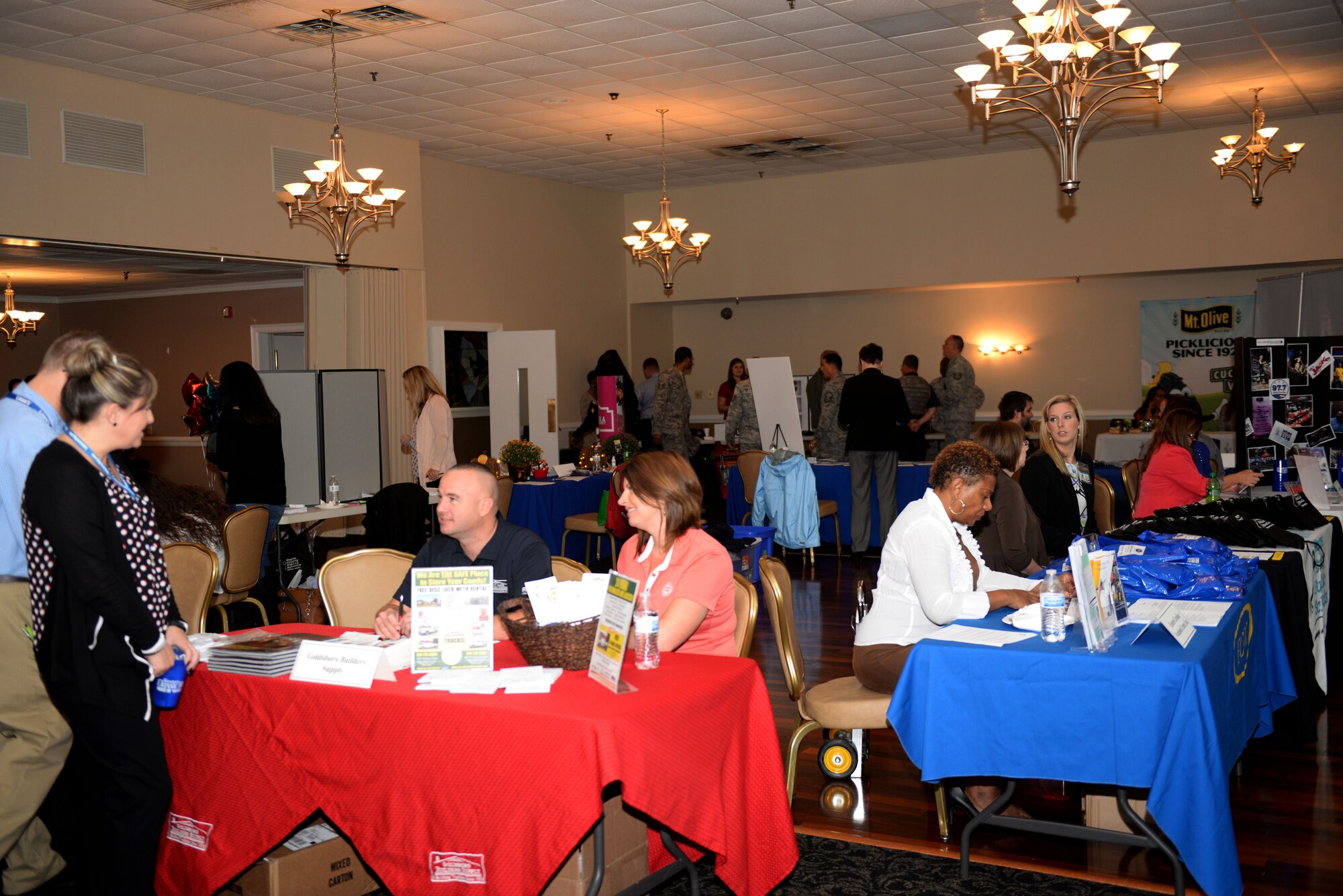 Members of Team Seymour meet with a variety of employers at a job fair, Oct. 6, 2015, at Seymour Johnson Air Force Base, North Carolina. More than 40 employers participated in the annual event to both fill job openings and provide employment opportunities for base Airmen, spouses and retirees. (U.S. Air Force photo/Airman 1st Class Ashley Williamson)