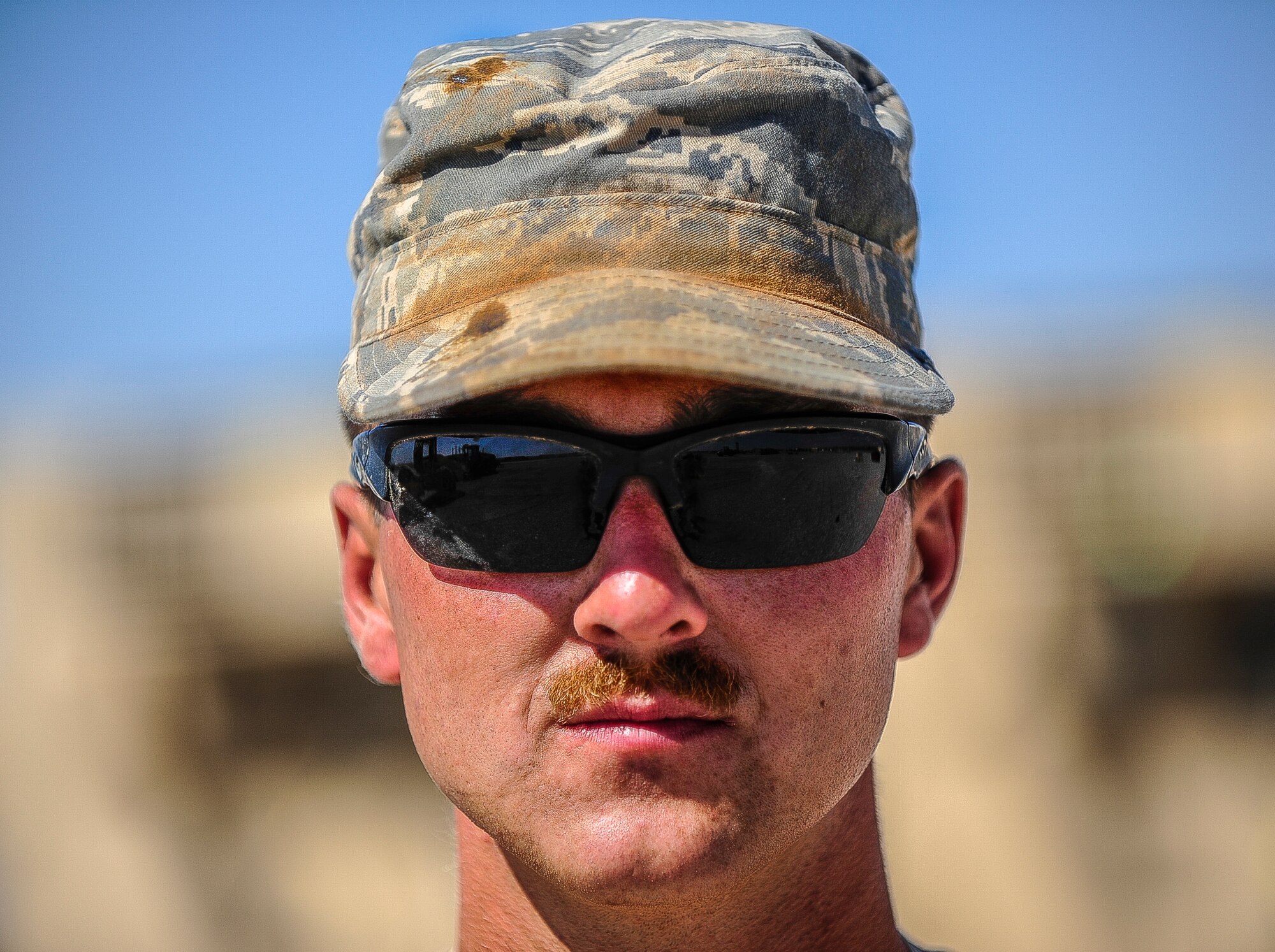 Staff Sgt. Logan Pals, 435th Construction Training Squadron pavements and construction equipment operator, is one of eight ‘Dirt Boys’ building the foundation of a ‘bare base’ Sept. 24, 2015, at Diyarbakir Air Base, Turkey. Under the 435th CTS, Pals teaches and instructs other Airmen within his career field on bare base construction throughout the European Command. (U.S. Air Force photo by Airman 1st Class Cory W. Bush/Released)