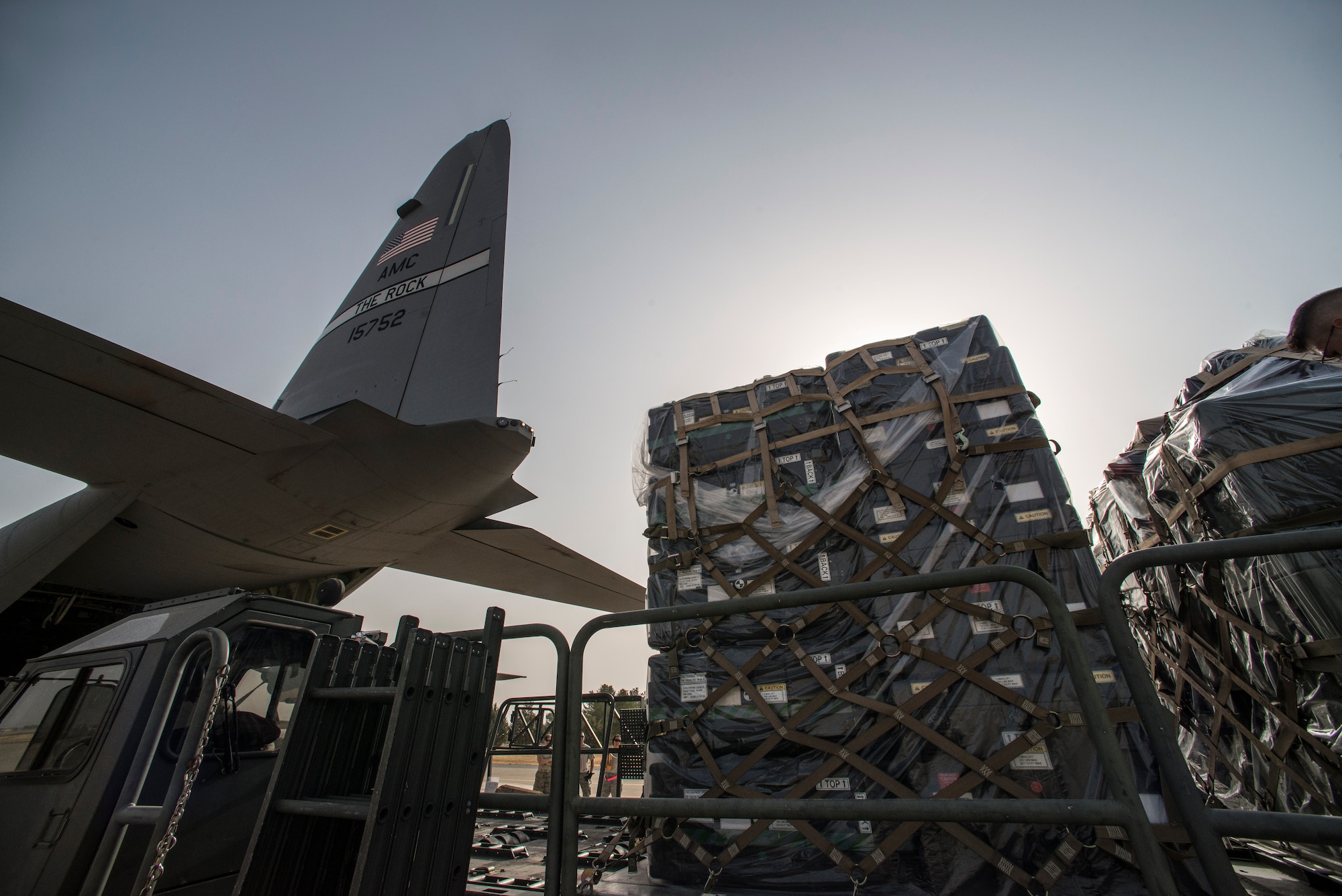 Equipment is unloaded from a C-130J Super Hercules, assigned to Little Rock Air Force Base, Sept. 15, 2015, at Diyarbakir Air Base, Turkey. The equipment delivery is in is in support of the 435th Contingency Response Squadron’s  build up of U.S. Air Forces Central Command’s personnel recovery deployment site and facilities at DAB. The 435th CRG has received more than 680 tons of equipment to conduct and support operations. (U.S. Air Force photo by Airman Cory W. Bush/Released)