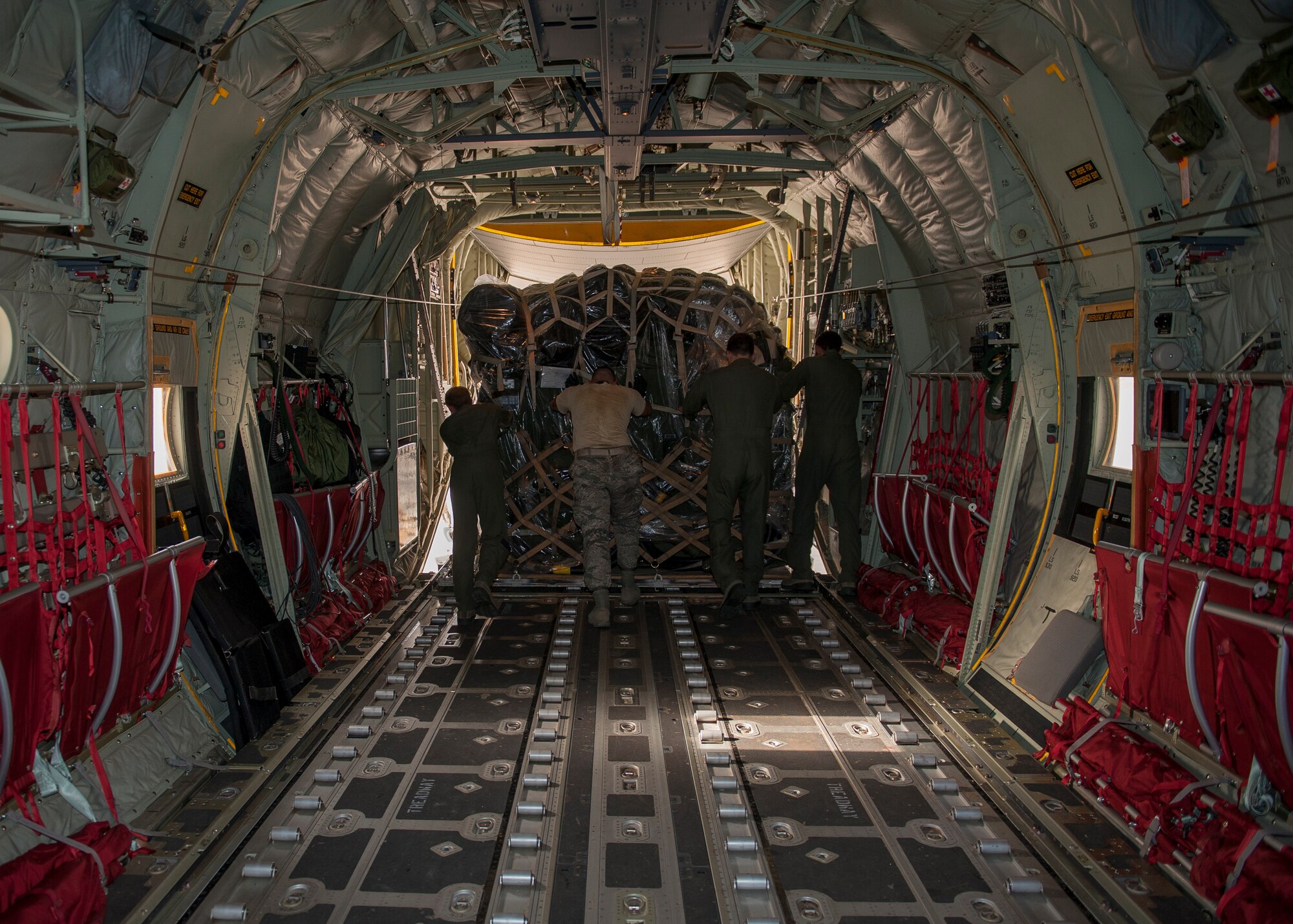 Deployed Airmen from the 435th Contingency Response Group unload cargo from a C-130J Super Hercules Sept. 15, 2015, at Diyarbakir Air Base, Turkey. The 435th CRG is made up of a variety of 29 Air Force Specialty Codes including loadmasters and aircrew support staff. The group has deployed approximately 80 Airmen to set up initial life support and operation facilities for the bed-down of U.S. Air Forces Central Command’s personnel recovery forces supporting Operation Inherent Resolve. (U.S. Air Force photo by Airman Cory W. Bush/Released)