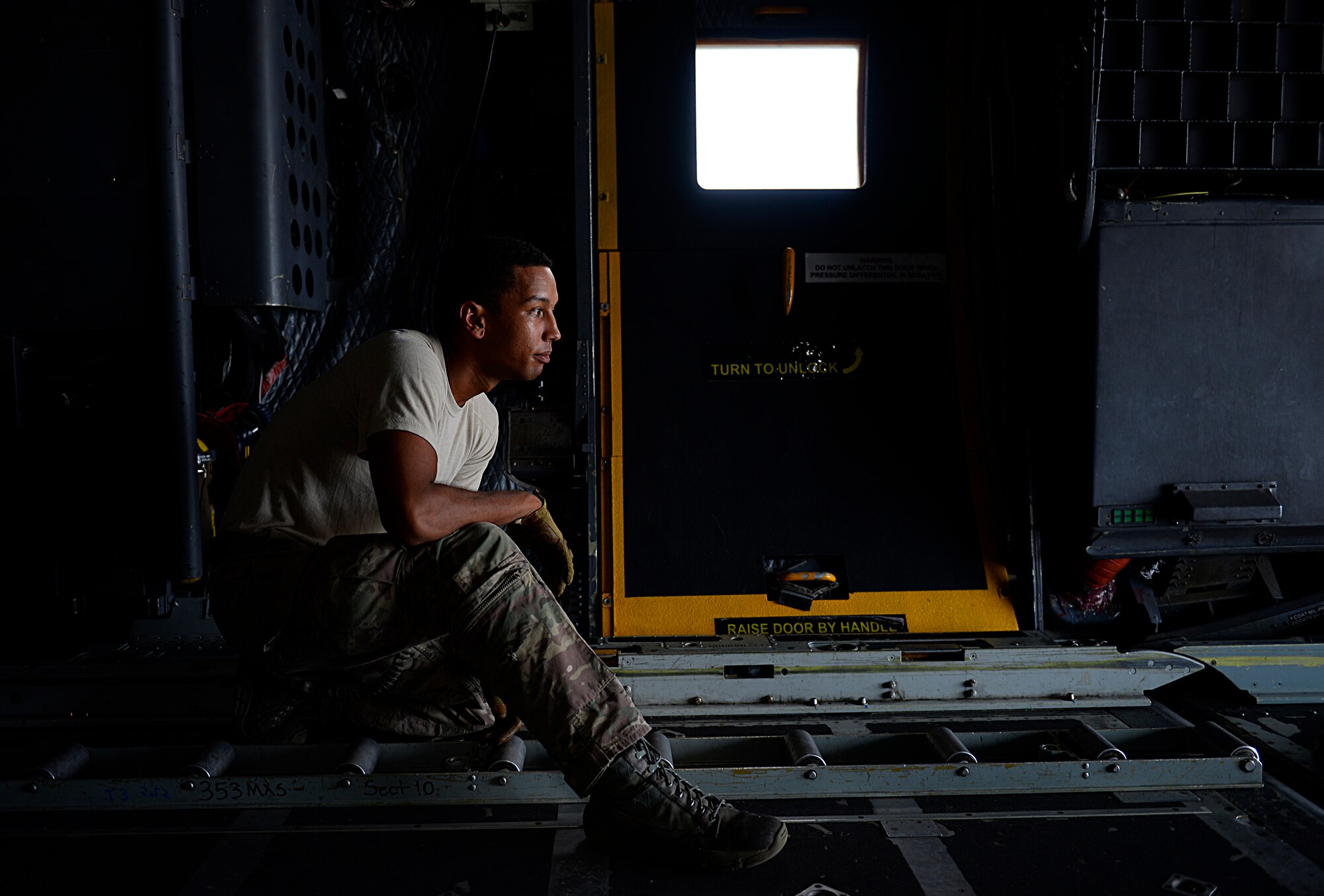 A loadmaster guides the driver of a load carrier toward a MC-130H Combat Talon II during an exercise Sept. 18, 2015, at Andersen Air Force Base, Guam. The MC-130H was part of a dissimilar formation with an MC-130J that completed a Maritime Craft Aerial Delivery System airdrop. This was the first time an MC-130J Commando II completed the MCADS airdrop in the Pacific. (U.S. Air Force photo by Staff Sgt. Alexander Riedel)