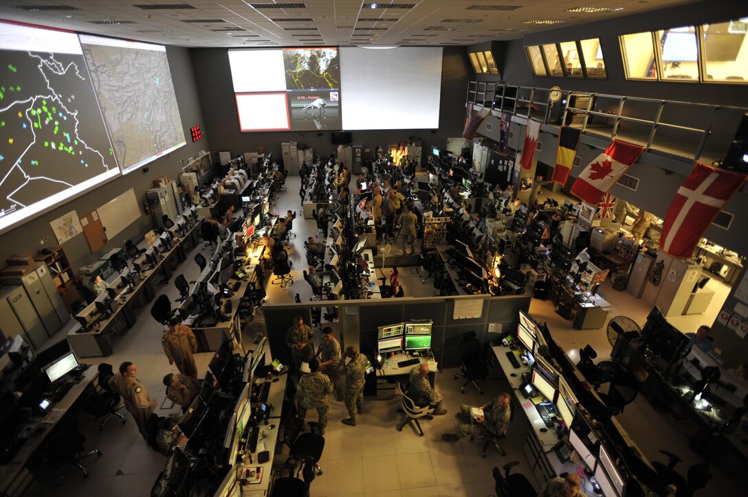 Combined Air Operations Center (CAOC) at Al Udeid Air Base, Qatar, provides command and control of air power  throughout Iraq, Syria, Afghanistan, and 17 other nations.  The CAOC is comprised of a joint and Coalition team that executes day-to-day combined air  and space operations and provides rapid reaction, positive control, coordination, and de-confliction of weapon systems. (U.S. Air Force photo by Tech. Sgt. Joshua Strang)
