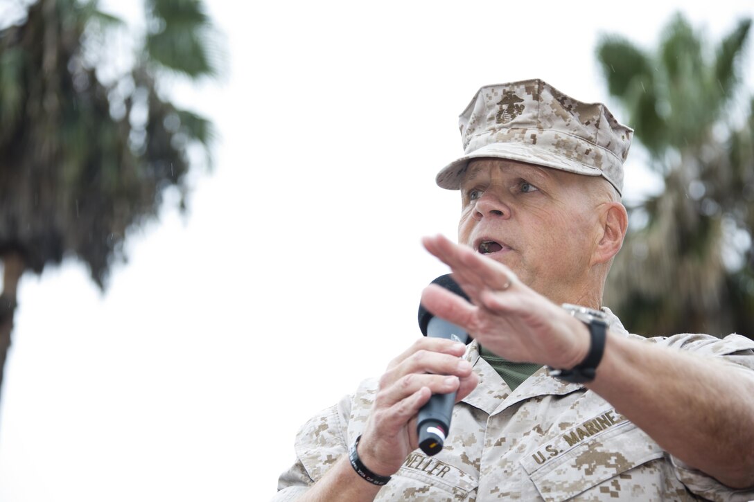 Commandant of the Marine Corps, Gen. Robert B. Neller, speaks at the 22 Area Parade Deck, Camp Pendleton, Calif., Oct. 5, 2015. Neller outlined to Marines, Sailors and civilians the Corps current priorities, expectations, listened and answered Marines' questions. (U.S. Marine Corps photo by Sgt. Gabriela Garcia/Released)