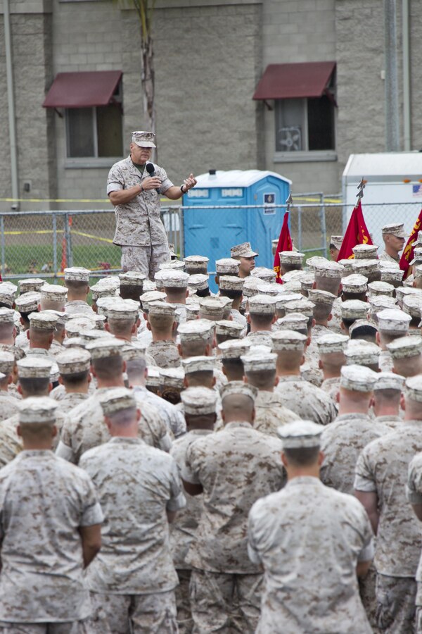 Commandant of the Marine Corps, Gen. Robert B. Neller, speaks to Marines, Sailors and civilians at the 22 Area Parade Deck, Camp Pendleton, Calif., Oct. 5, 2015. Neller outlined the Corps current priorities, expectations, listened and answered Marines' questions. (U.S. Marine Corps photo by Sgt. Gabriela Garcia/Released)