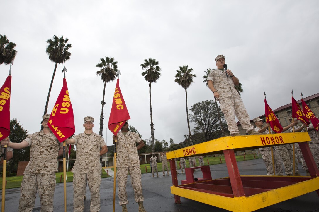 Commandant of the Marine Corps, Gen. Robert B. Neller, speaks to Marines, Sailors and civilians at the 22 Area Parade Deck, Camp Pendleton, Calif., Oct. 5, 2015. Neller outlined the Corps current priorities, expectations, listened and answered Marines' questions. (U.S. Marine Corps photo by Sgt. Gabriela Garcia/Released)