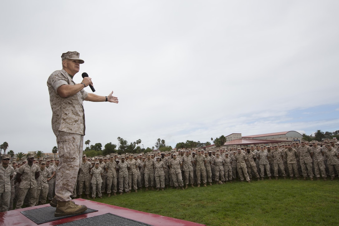Commandant of the Marine Corps, Gen. Robert B. Neller, speaks to Marines at the Mainside Parade Deck, Camp Pendleton, Calif., Oct. 5, 2015. Neller outlined the Corps current priorities, expectations, listened and answered Marines' questions. (U.S. Marine Corps photo by Sgt. Gabriela Garcia/Released)